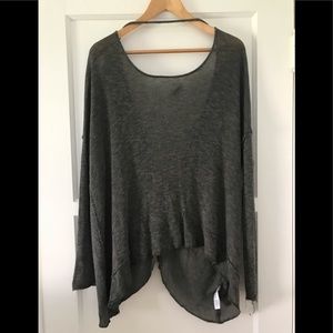 Relaxed fit free people sweater, with an open back